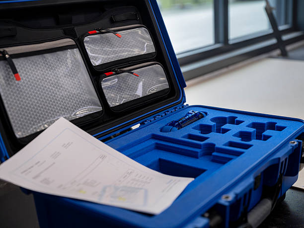 Open blue hard transport case featuring custom-molded foam compartments designed for specific equipment storage