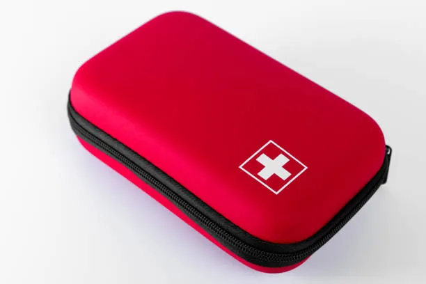 First Aid Kit.Red Protective Case With Swiss Cross Emblem Suitable For Travel And Storage Of Tools